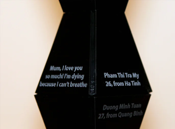 detail photo of Brâncuși style endless column engraved with names of the dead and sent txt