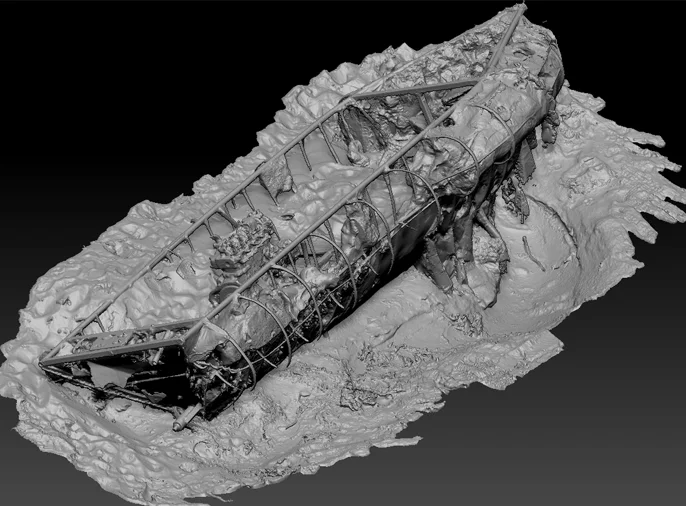 screenshot of 3D digital model of boat washed up on beach